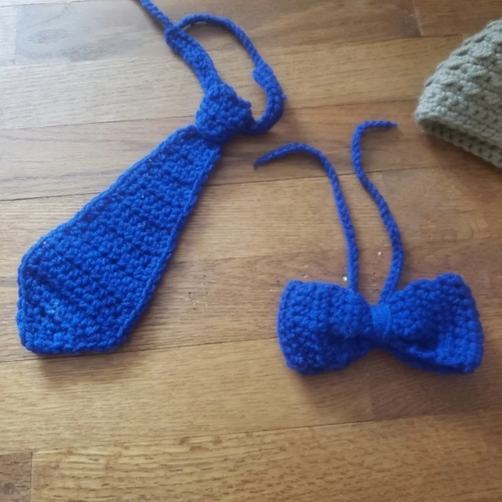 Beige diaper cover with blue‎ suspenders